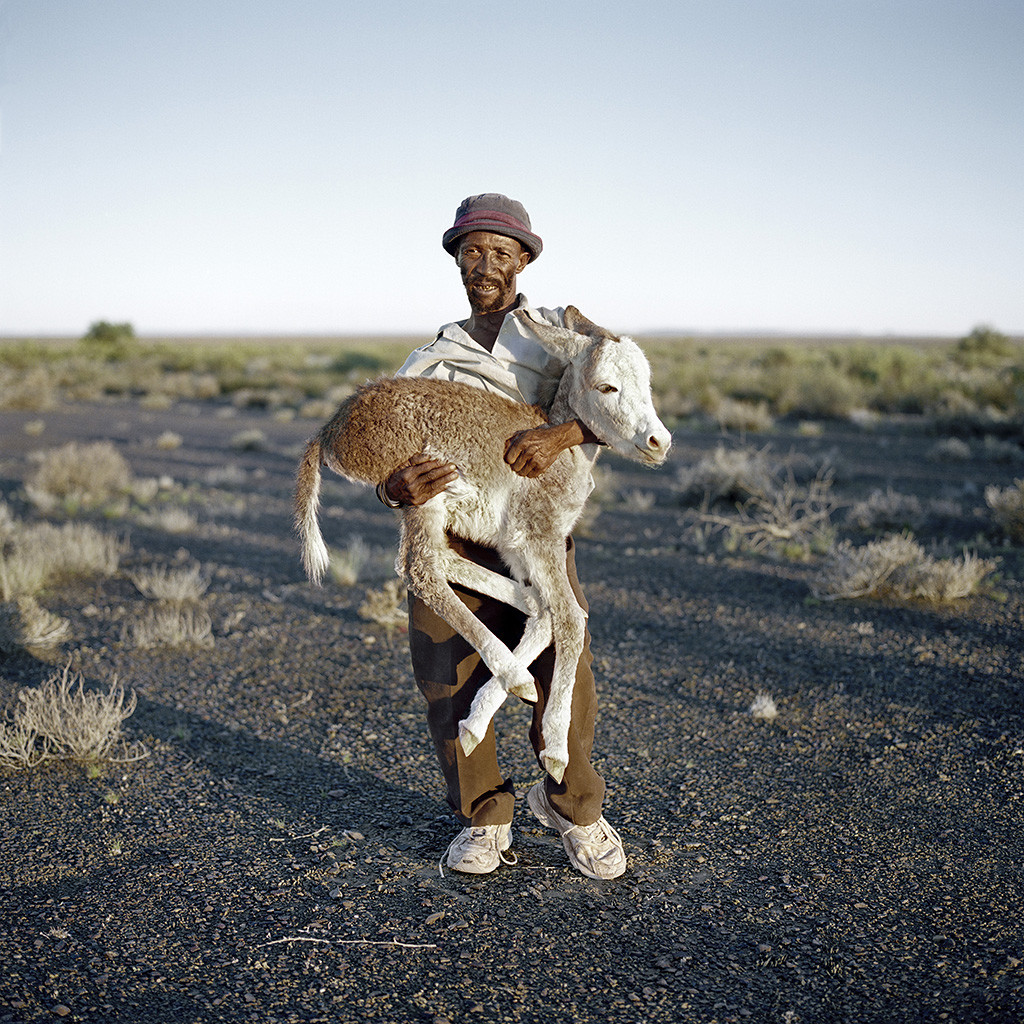 David Tieties with his three-day-old donkey. Verneukpan, Northern Cape, 6 April 2009